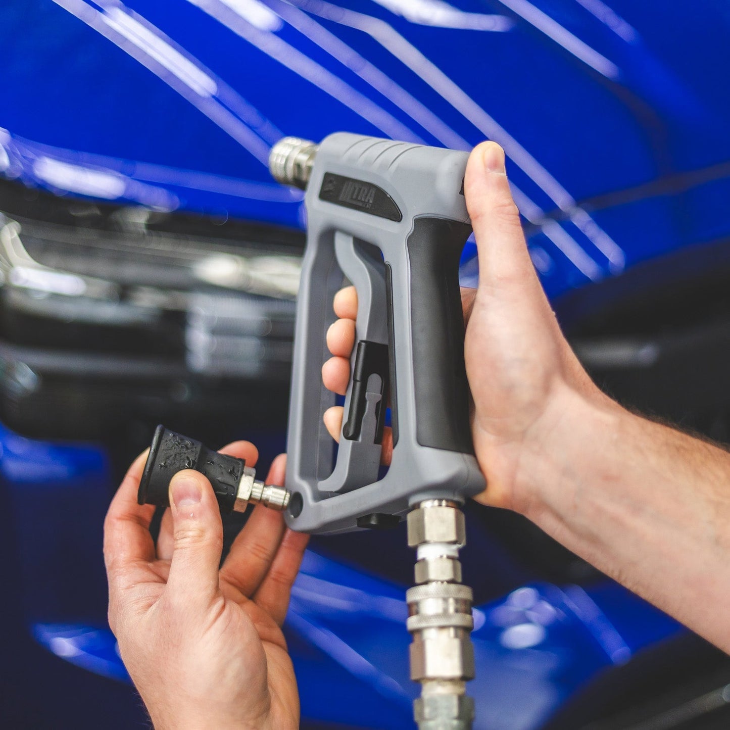 Ultra H2O Spray Gun washing a pickup truck