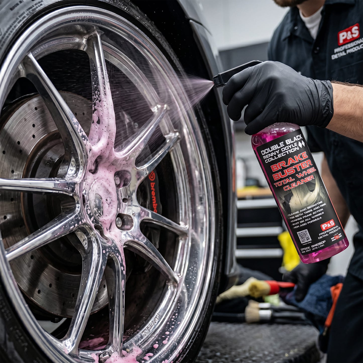 Detailer applying P&S Brake Buster to a polished aluminium wheel